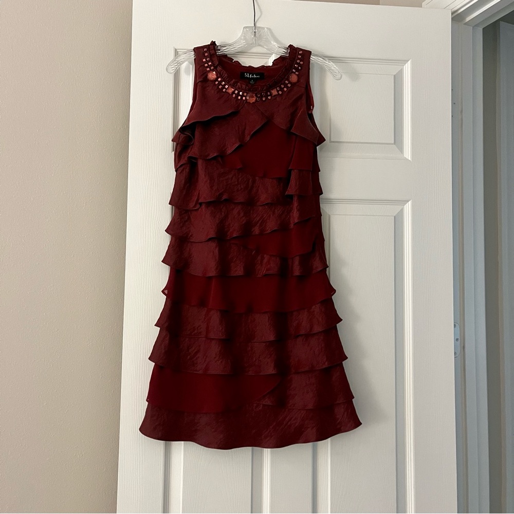 Sleeveless S.L. fashions cranberry cocktail dress w/ embezzled stones at neck
